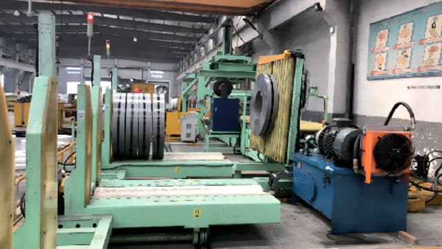 coil picking and tilting system